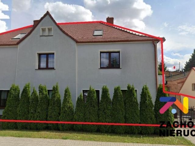 Komfortowy dom z dużym potencjałem i garażami