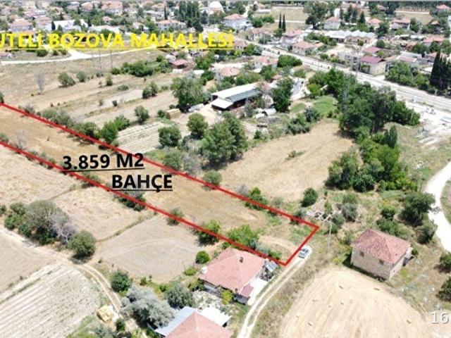 KORKUTELİ BOZOVA MAH. MERKEZİ KONUMDA 3.859 M2 BAHÇE
