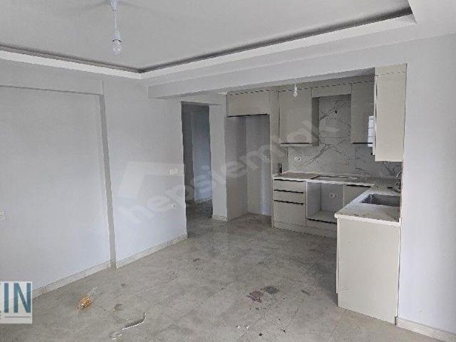 KÖYCEĞİZ'DE GENİŞ VE FERAH SIFIR 2+1 SATILIK GİRİŞ KAT DAİRE