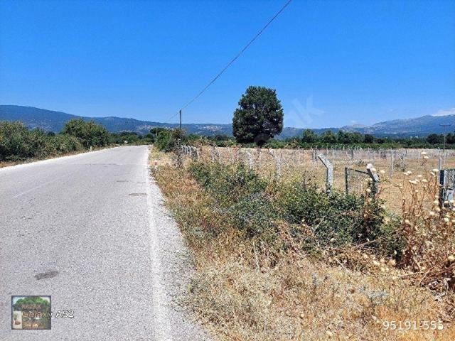 KOZAK YAYLASINDA KARAVELİLER MUHİTLERİ İÇİNDE ANA YOL KENARI 6400 M2 TARLA