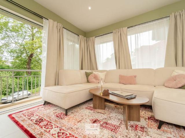 Klassevol appartement met zonneterras en garagebox!