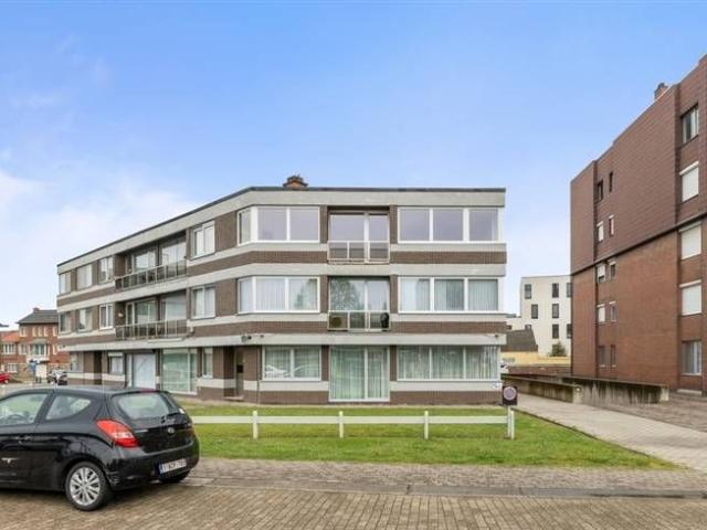 KNAP APPARTEMENT MET 2 SLKS EN PARKEERPLAATS VLAKBIJ HET CEN