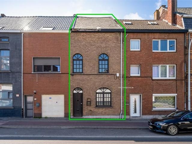 Knusse woning met twee slaapkamers en koer