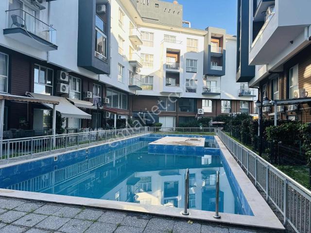 Krediye Uygun Satılık Havuz Cepheli Eşyalı 1+1 Daire