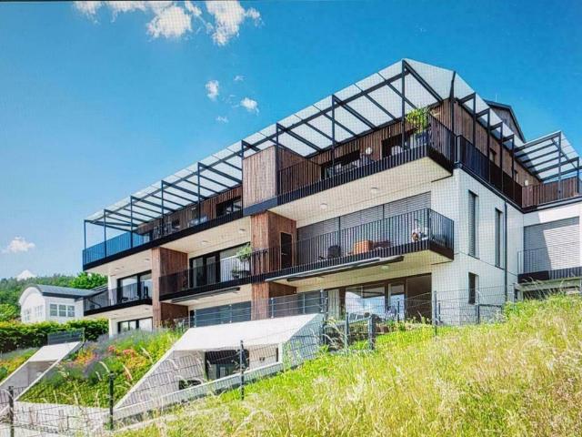 Krumpendorf am Wörthersee Einzigartige Eigentumswohnung mit Pool und Seeblick | Krumpendorf am Wörthersee unique apartment with pool and sea view