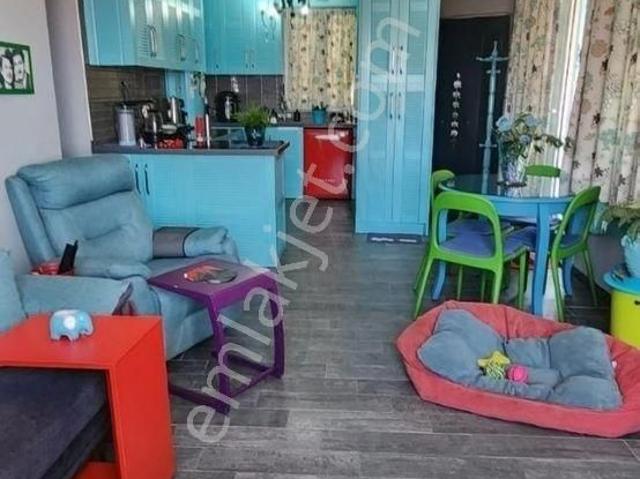 Kuşadası Merkez’de Satılık Lıman Manzaralı Teraslı Şırın 2+1 Eşyalı Daıre