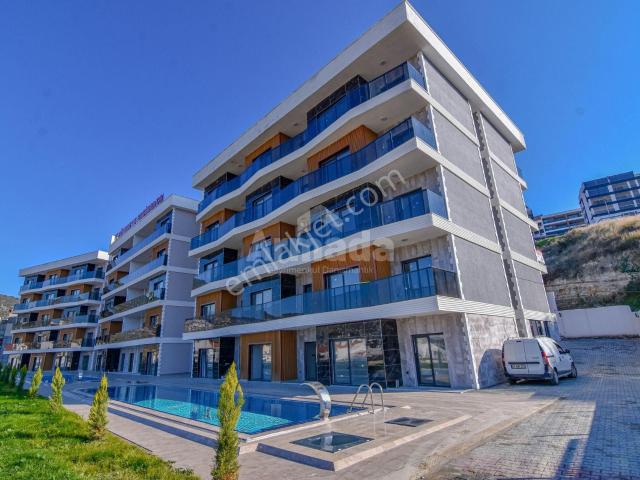 Kuşadası Merkezde Sıfır 1+1 Satılık Daire