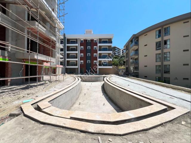 Kuşadası Merkezde Satılık Sıfır Arakat 1+1 Daire