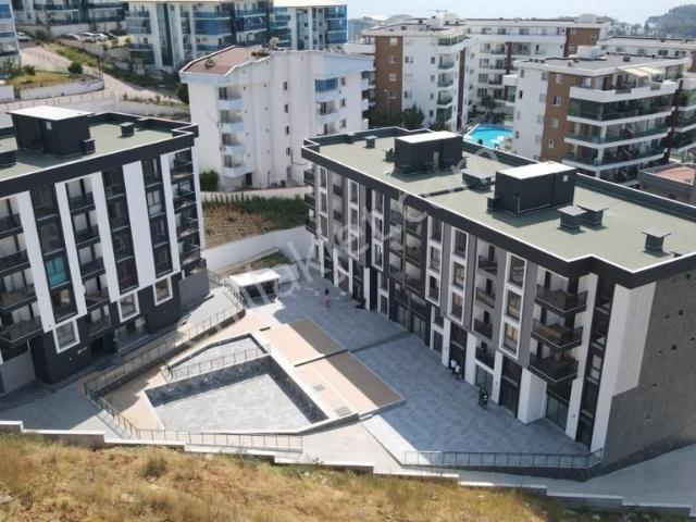 Kuşadasında Denize Yakın Kat Mülkiyetli Satılık Sıfır 1+1