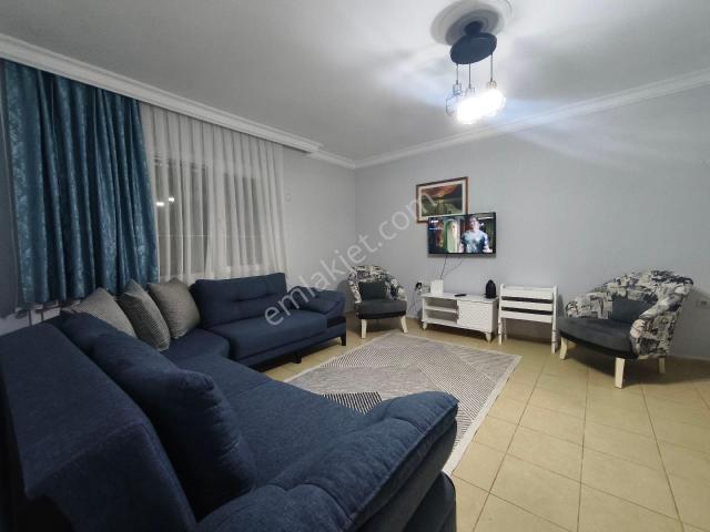 Kuşadası'nda Havuzlu Sitede 5+1 Eşyalı Kiralık Villa
