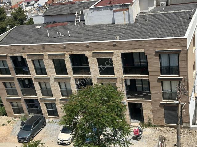 Kuşadası Alacamescit Mahallesinde Satılık Yeni 1+1 60 M2 Daire