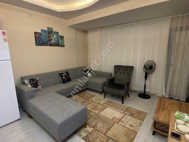 Kuşadası Davutlar Merkezde Havuzlu 1+1 Satılık Daire