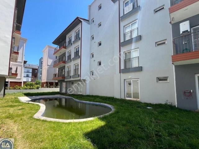 Kuşadası Davutlar’da Havuzlu Sitede 2 + 1 Daire
