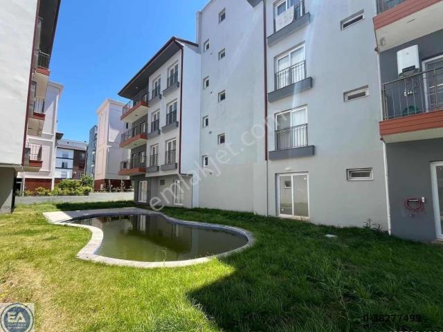 Kuşadası Davutlar'da Havuzlu Sitede 2 + 1 Satılık