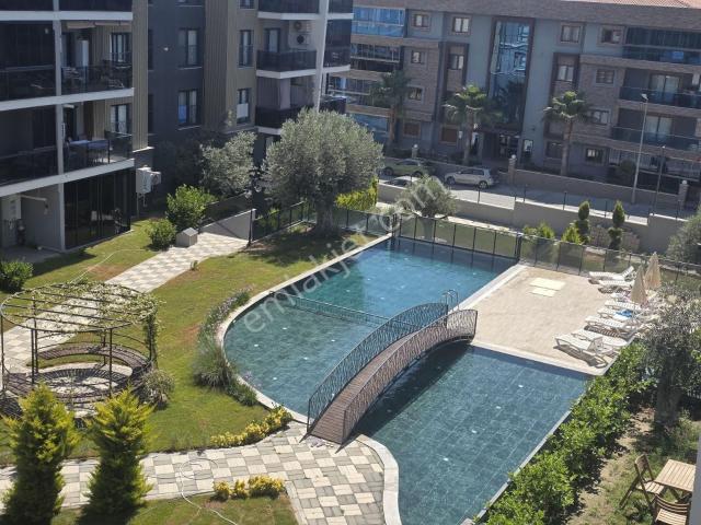 Kuşadası Değirmendere Mahallesi'nde Havuzlu 2+1 Satılık Daire