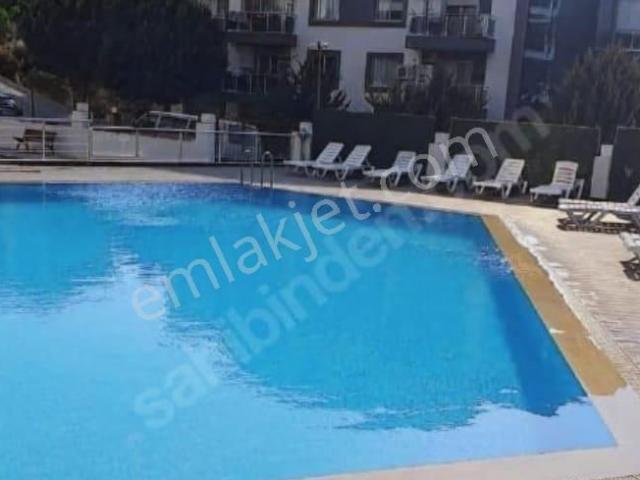 Kuşadası Ege Mahallesi Havuzlu Güvenlikli Sitede Doğalgazlı 1+1
