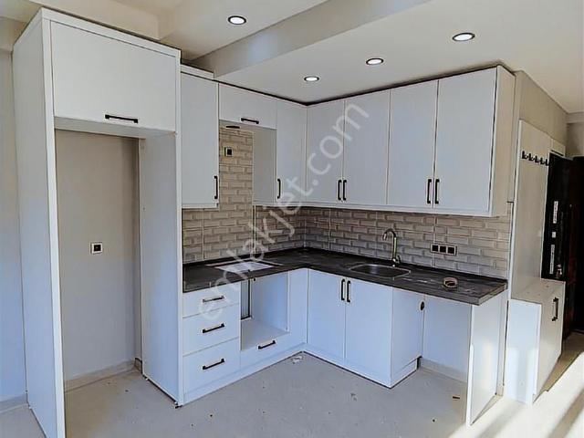 Kuşadası Güzelçamlı'da Doğa Manzaralı Geniş 1+1 Sıfır Daire