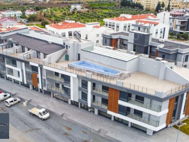 KUŞADASI DAVUTLAR HAVUZLU SİTE DE 1+1 KAPALI OTOPARKLI REZİDANS DAİRE