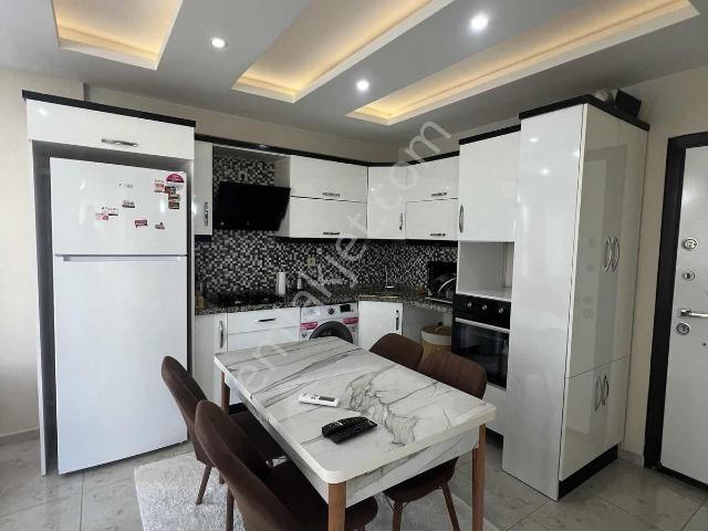 Kulepark~farkıyla~btü~üniversite~yakını~1+1~eşyalı~geniş~6~katlı