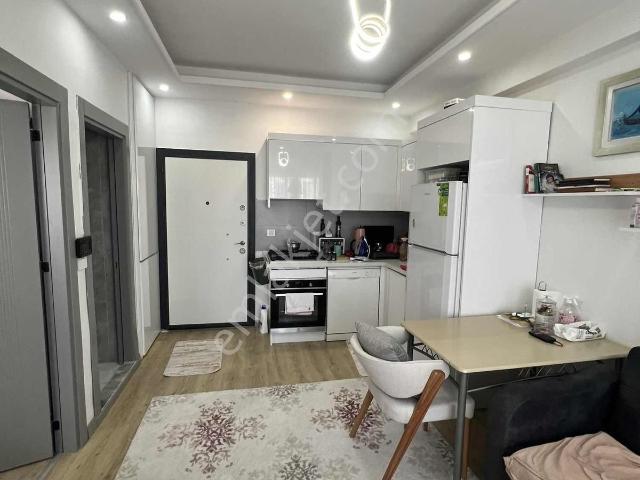 Kulepark~farkıyla~çok~geniş~40~m2net~oturumlu~1+1~eşyalı~satılık