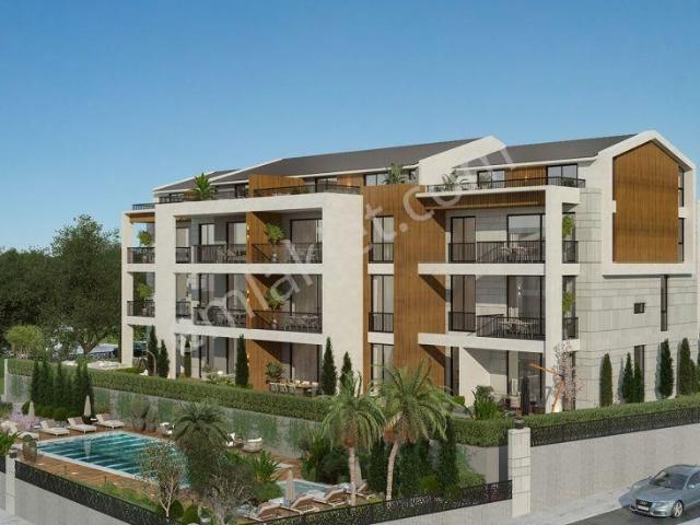 Kusadasında Satılık Sahıle 500 M guvenlık kapalı Otopark havuz yerden Isıtma ultra Lüx 1+1