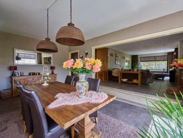 Landelijke, instapklare woning met achterliggende hal op 18a