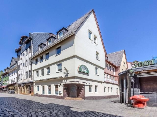 Langfristige Investitionschance in Sachsenhausen! Wohn und Geschäftshaus in zentraler Lage