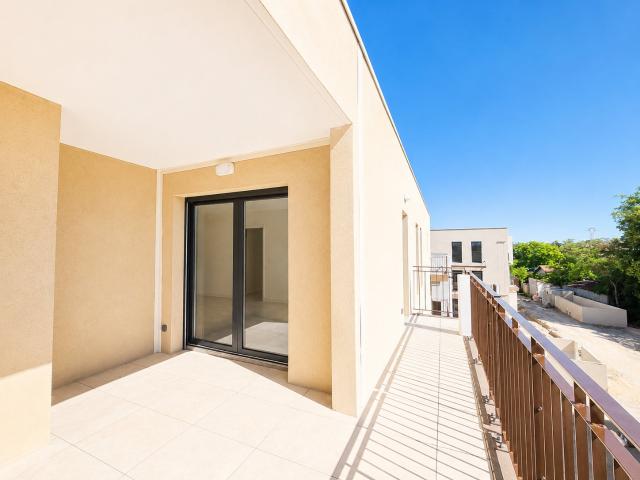 LE PONTET Appartement T3 de 66,43 m2 au dernier étage avec balcon