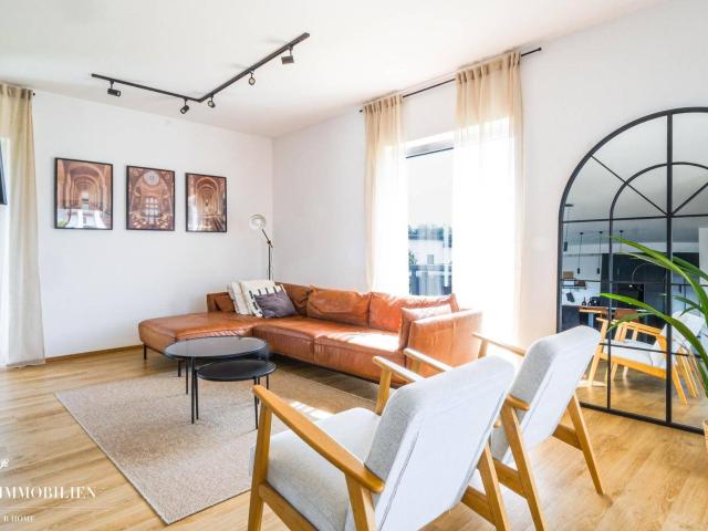 LEOMBACH Moderner Bungalow