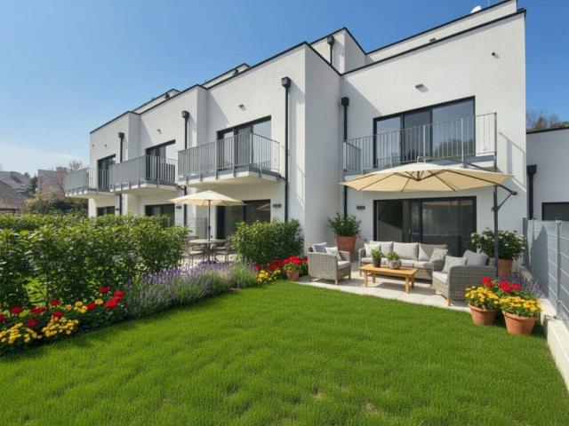 LEBENSQUALITÄT MIT AUSSICHT EXKLUSIVES TOWNHAUS AUF EIGENGRUND IN WEIDLING – NATURNAHES WOHNEN MIT STIL