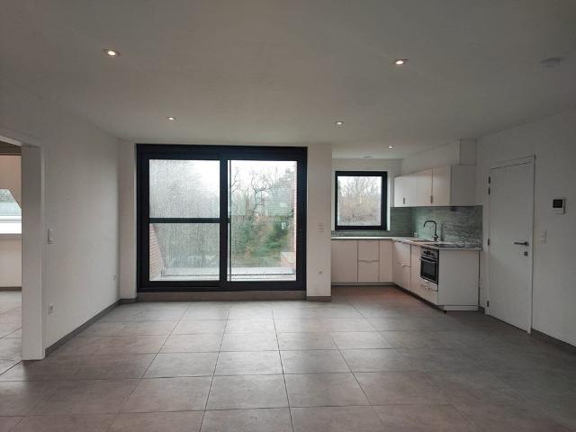 Leuk en modern 2 slaapkamer appartement gelegen te Olmen centrum !