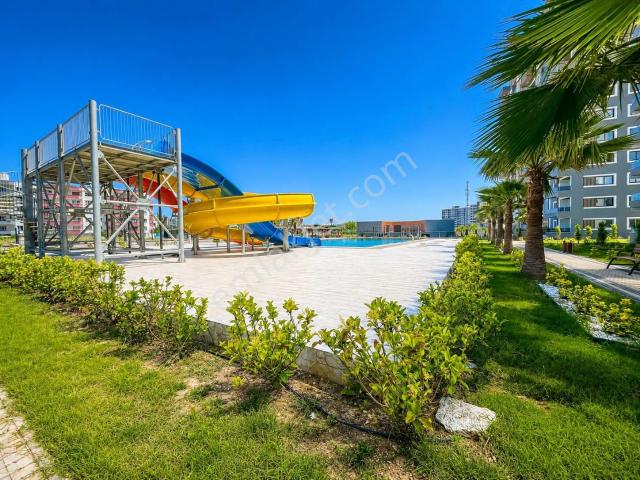 Limonlu'da Havuzlu Site İçerisinde, Deniz Manzaralı Satılık 2+1 Daire