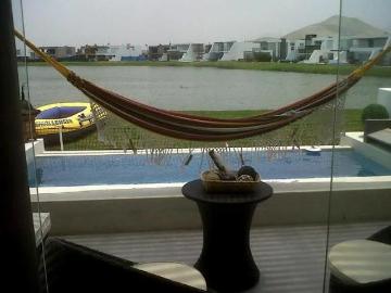 Linda casa de playa en condominio