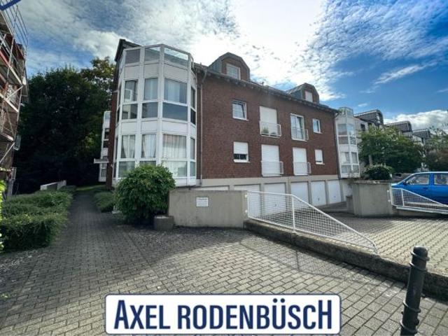 Liblar, schicke Maisonettewohnung in zentraler Lage mit sonniger Dachterrasse!