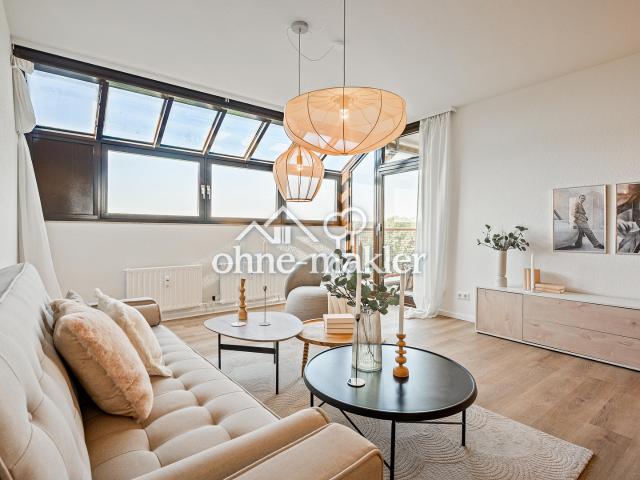 Lichtdurchflutete 3 Zimmer Wohnung mit Balkon ins Grüne & Tiefgaragenstellplatz