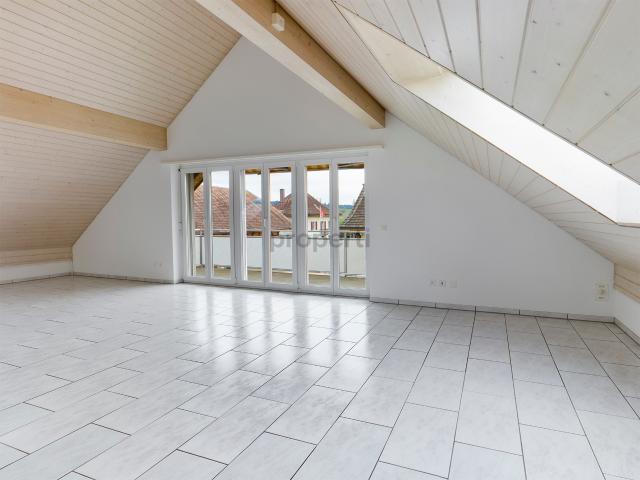 Lichtdurchflutete Dachwohnung mit sonnigem Südbalkon