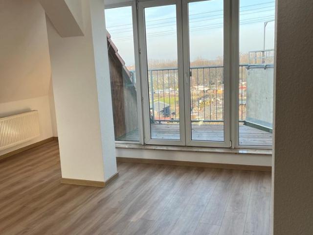 Lichtdurchflutete Maisonette Wohnung mit Balkon und Parkblick