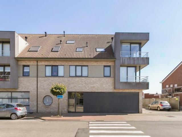 Lichtrijk appartement met garage in het centrum Wielsbeke!