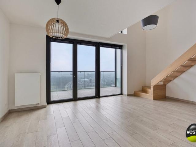 Lichtrijk duplex appartement met Uniek uitzicht over de H.