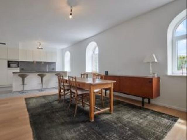 Lichtrijk nieuwbouwappartement met zonnige tuin
