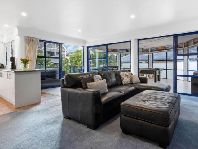 Live directly opposite the beautiful Orewa Beach!
