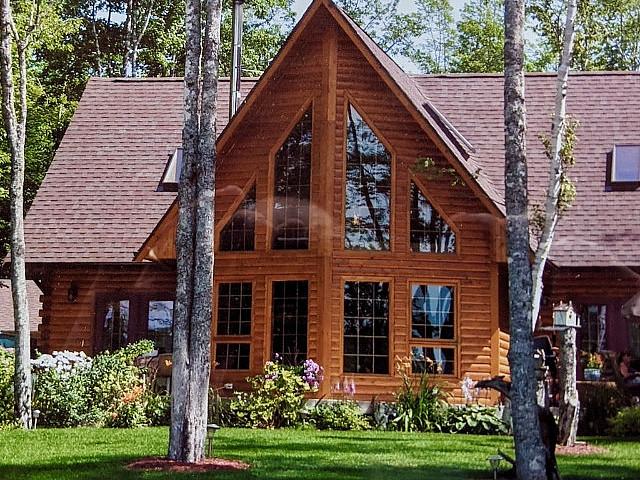 Live Your Dream In This Classic Chalet Log Home