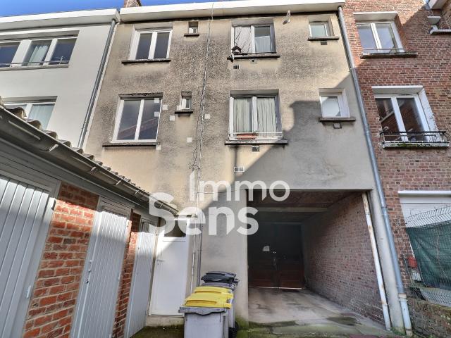 Lomme Immeuble de rapport loué avec garages et box