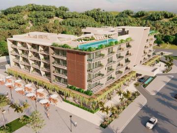 Local comercial a 3 minutos de la playa, en edificio de condominios, pre constru