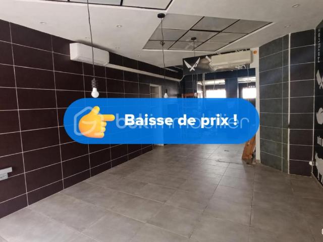 À vendre – Murs commerciaux avec appartement indépendant et 2 caves