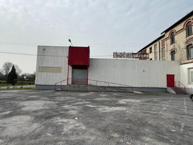 LOCAL COMMERCIAL 335 m² AVEC GRAND PARKING – BUIRE 02500