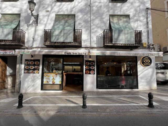 Local, Recogidas, Granada