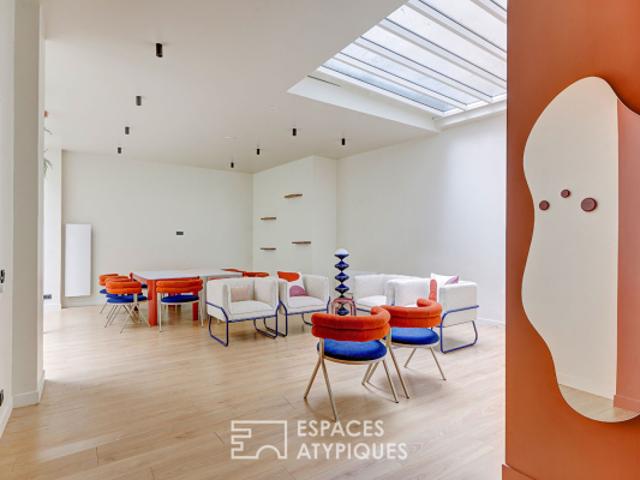 Loft avec verrières rénové en rez de cour Villiers / Europe