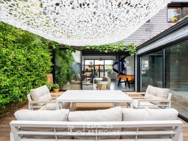 Loft contemporain avec piscine intérieure et terrasses