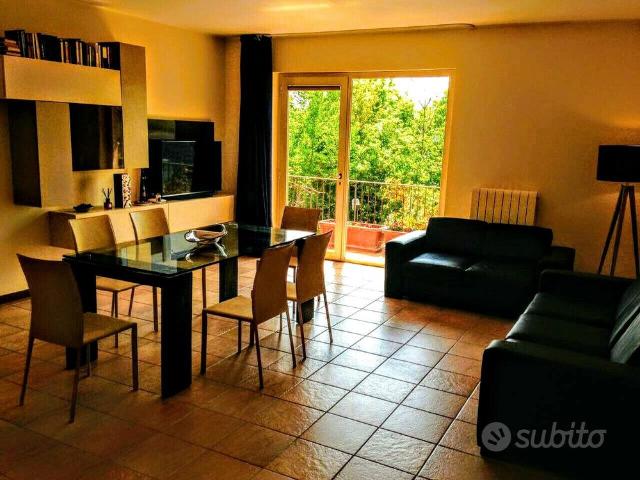 Loft elegante con posto auto in garage